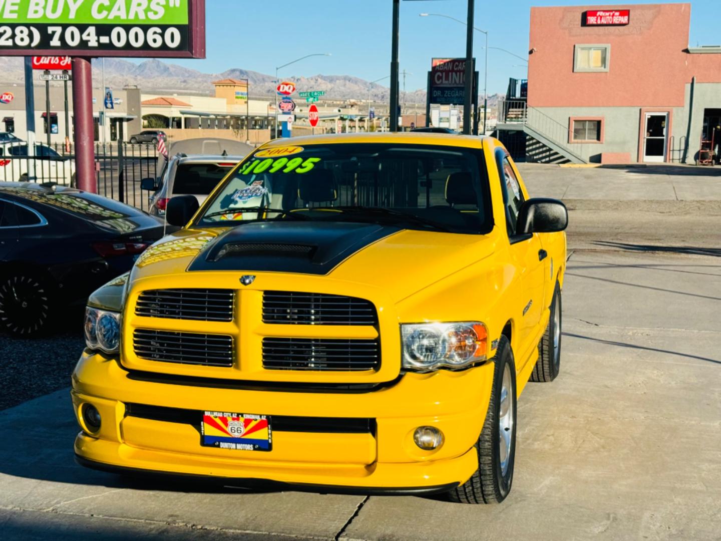 2004 Yellow /black Dodge Ram 1500 (1D7HA16D54J) , located at 2190 Hwy 95, Bullhead City, AZ, 86442, (928) 704-0060, 0.000000, 0.000000 - 2004 Dodge Ram SLT Bumblebee edition. Bright yellow with a black leather interior with yellow trim. This limited Bumblebee edition truck will sure turn heads. Hemi engine. 20 in wheels . *1 owner. matching tonneau cover. In excellent shape. 2004 Dodge Ram 1500 Rumble Bee. It is a limited edition tru - Photo#3